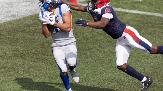 Apr 2, 2023; Houston, TX, USA; St. Louis Battlehawks wide receiver Darrius Shepherd (11) catches a touchdown pass against the Houston Roughnecks defensive back Ajene Harris (3) in the fourth quarter at TDECU Stadium. Mandatory Credit: Thomas Shea-USA TODAY Sports  